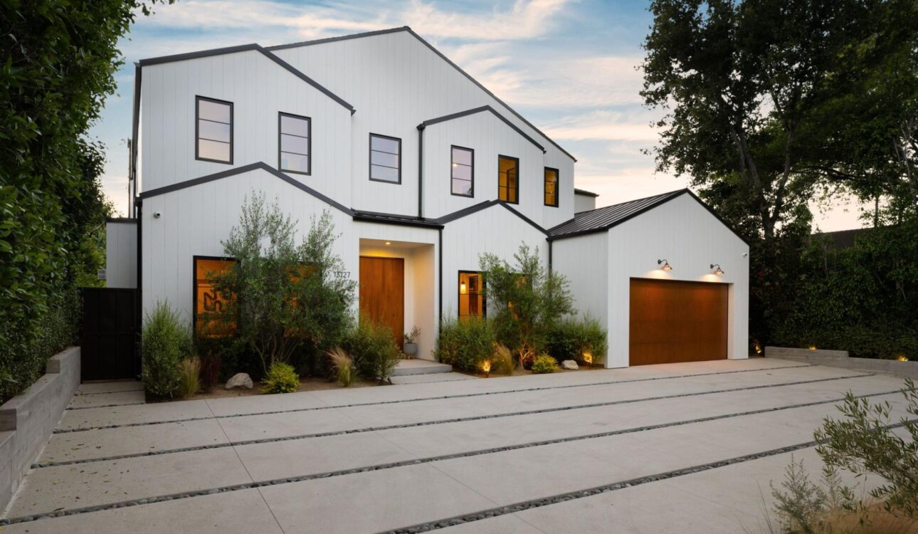 The exterior of a blue remodeled home.