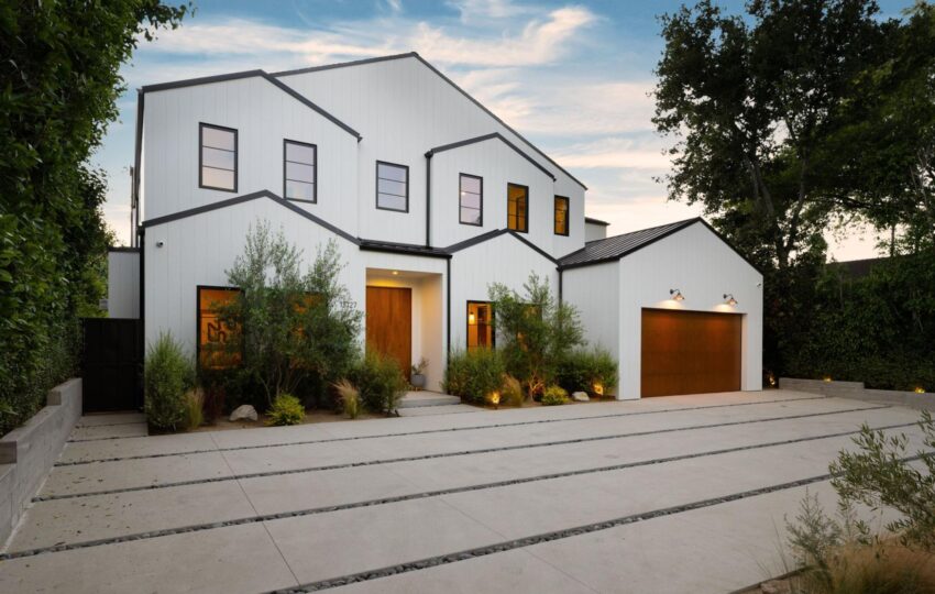The exterior of a blue remodeled home.