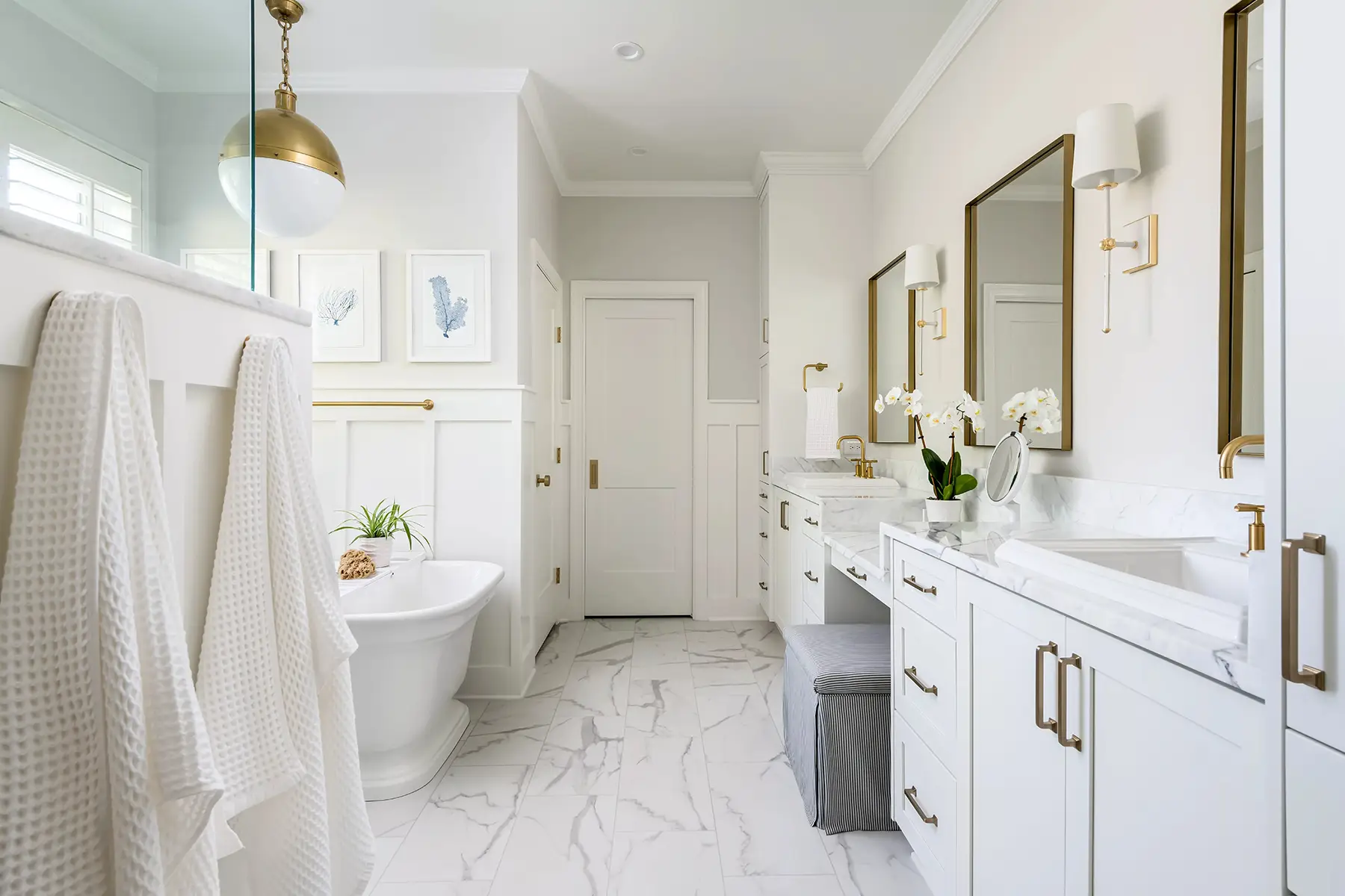 Mt Lucas Rd, Princeton, NJ 08540 1 | The Home X Bright white bathroom featuring double vanity with quartz countertops, large framed mirror, and a walk-in shower with glass enclosure.