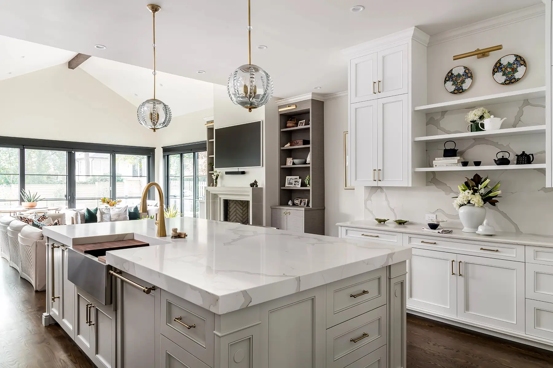 Moore St, Princeton, NJ 08540 2 | The Home X Bright transitional kitchen with a large island, barstools, and glass pendant lighting.