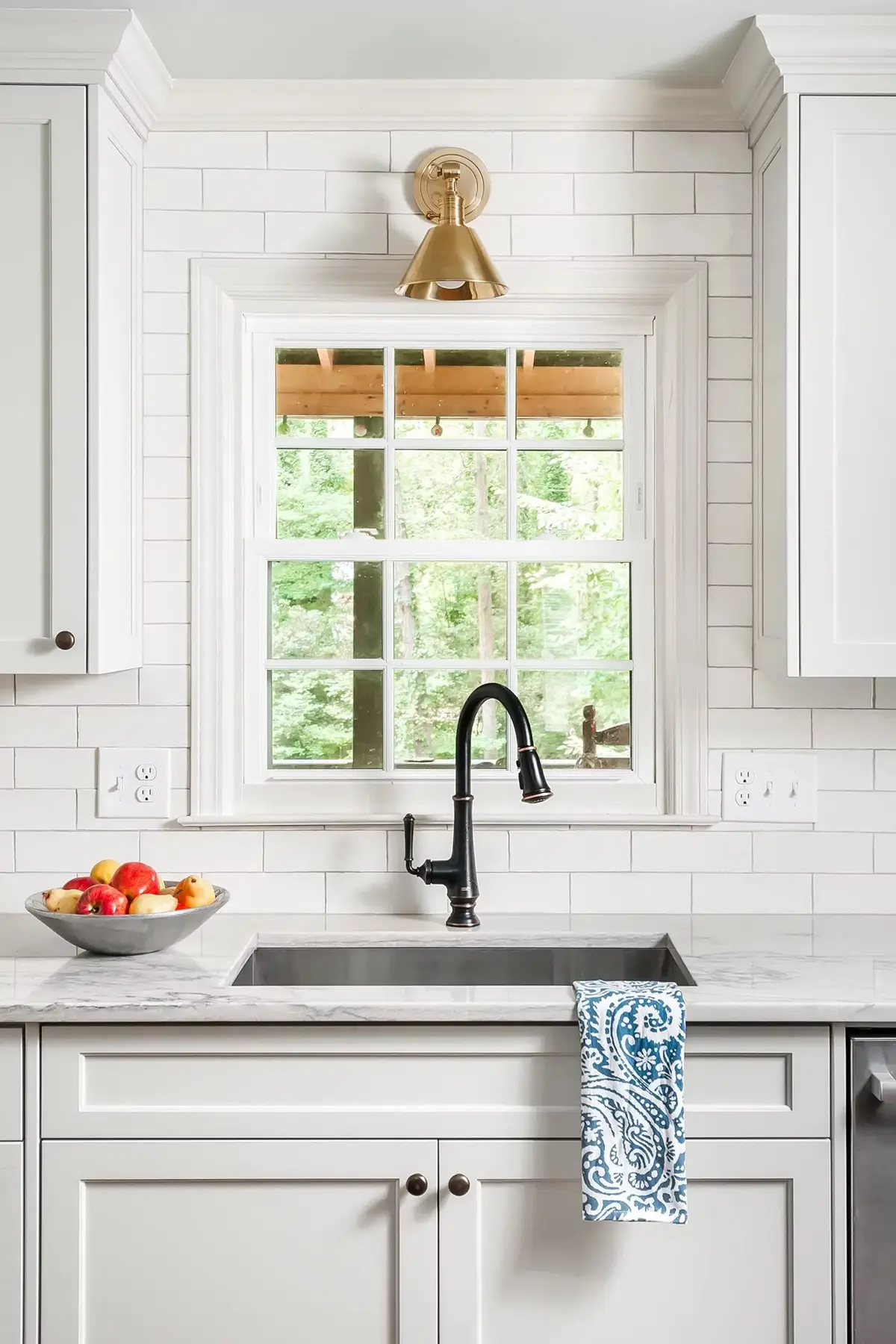 Pineville Rd, Newtown, PA 18940 8 | The Home X White kitchen with glass cabinet doors, butcher block counters, and black accents.