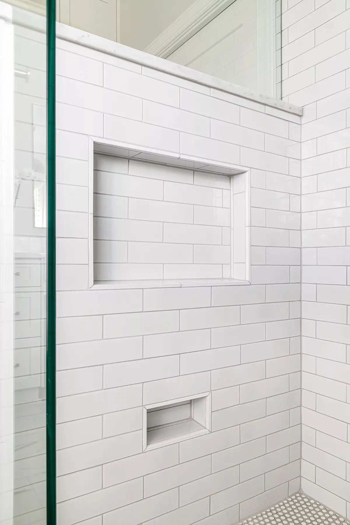Mt Lucas Rd, Princeton, NJ 08540 9 | The Home X Modern shower with white subway tile and a built-in niche shelf featuring matte black hardware.