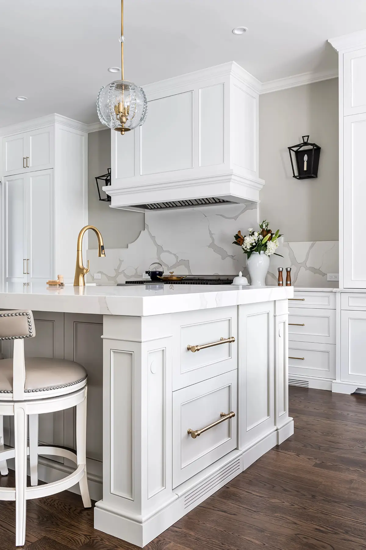 Moore St, Princeton, NJ 08540 12 | The Home X Elegant white kitchen island with decorative corbels and detailed cabinetry.