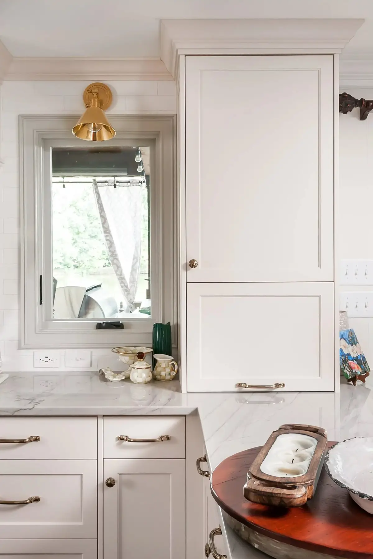 Lake Dr, Princeton, NJ 08540 11 | The Home X Compact beverage nook with white cabinets, oak shelves, and brass sconce in a Princeton, NJ remodel