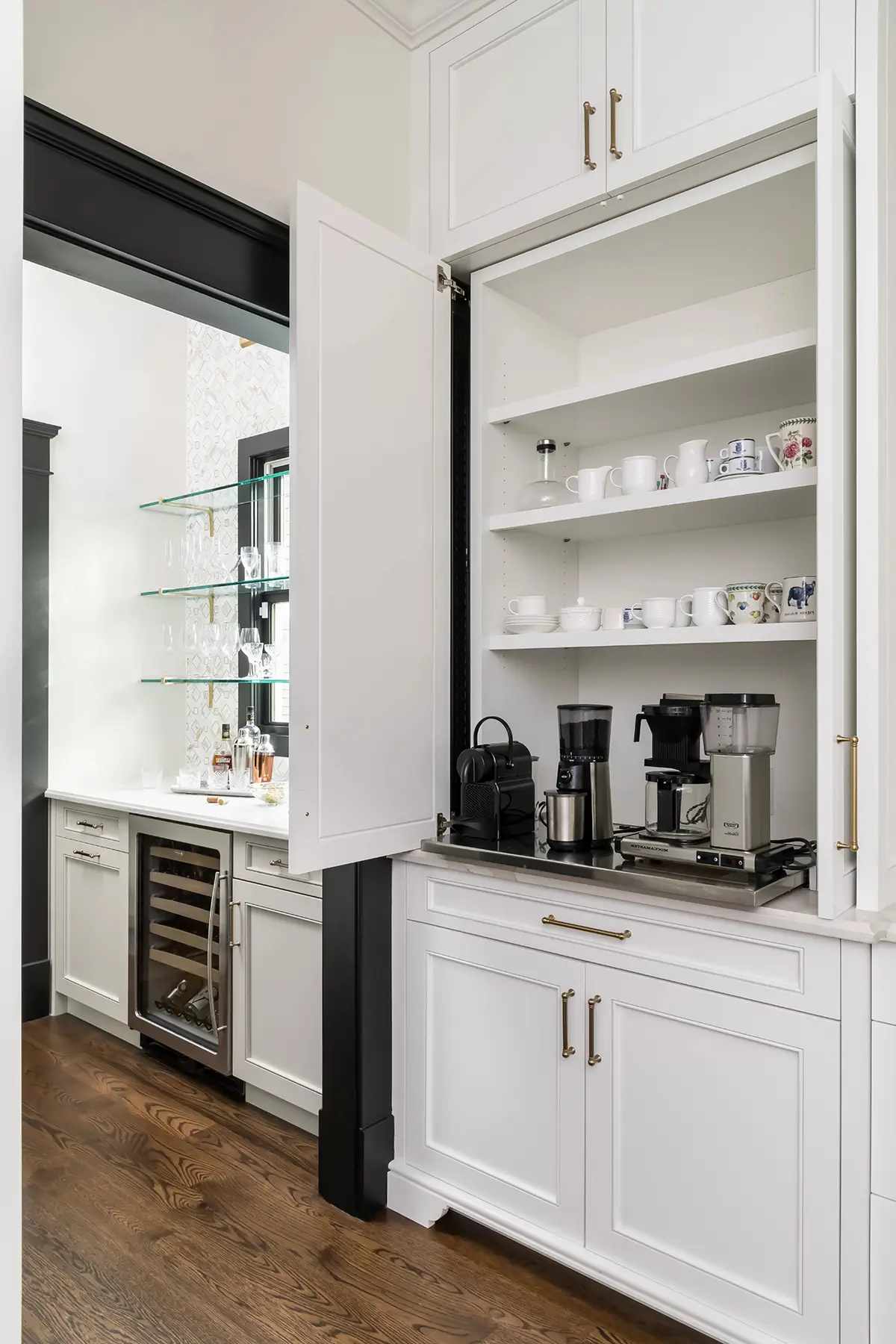 Moore St, Princeton, NJ 08540 16 | The Home X Custom white beverage center with glass shelving, quartz countertop, and built-in wine fridge.