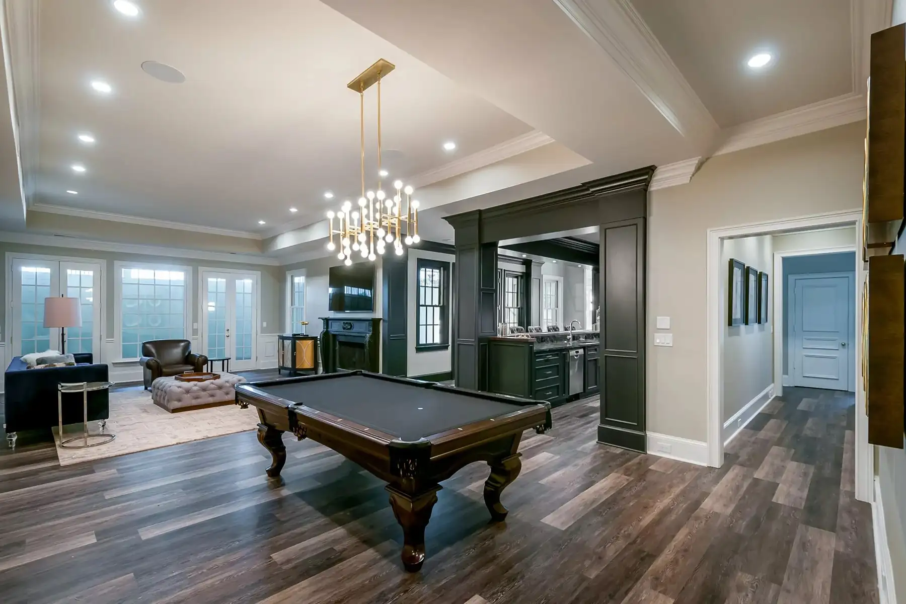 Lower Mountain Rd, New Hope, PA 18938 1 | The Home X Spacious finished basement with pool table, recessed lighting, and wide plank flooring in New Hope, PA remodel.