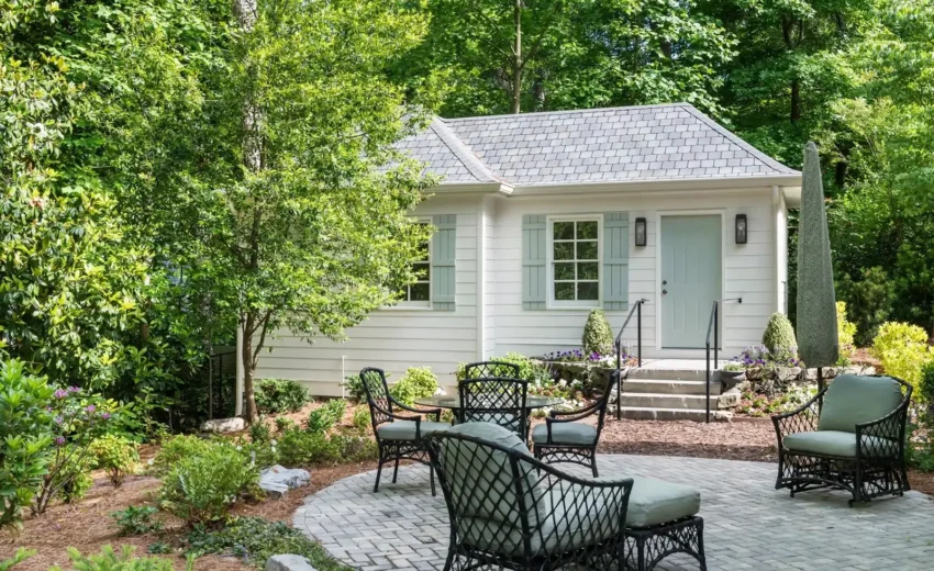 Luxury home remodel featuring updated exterior, new roofline, and architectural landscaping at 01 Pennington Titusville Rd in Pennington, NJ by The Home X.