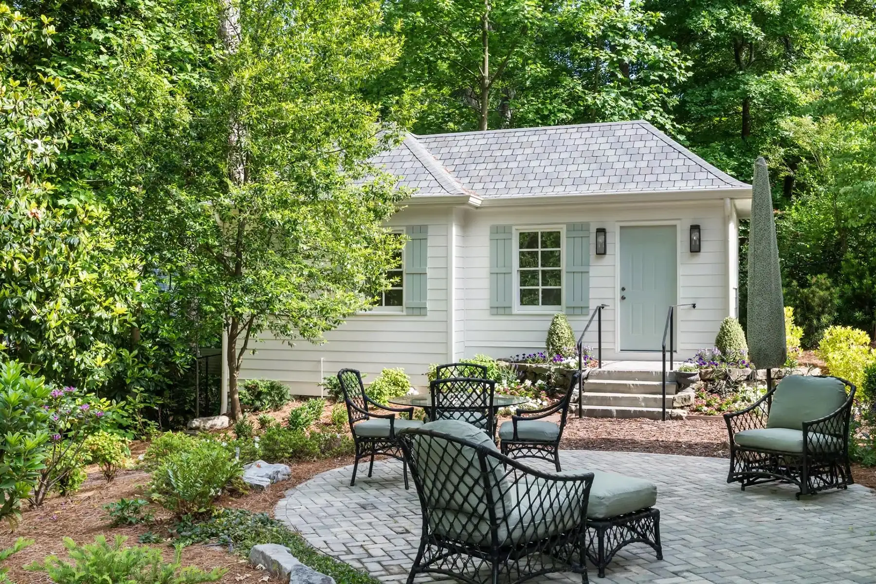 FAQs 1 | The Home X Luxury home remodel featuring updated exterior, new roofline, and architectural landscaping at 01 Pennington Titusville Rd in Pennington, NJ by The Home X.