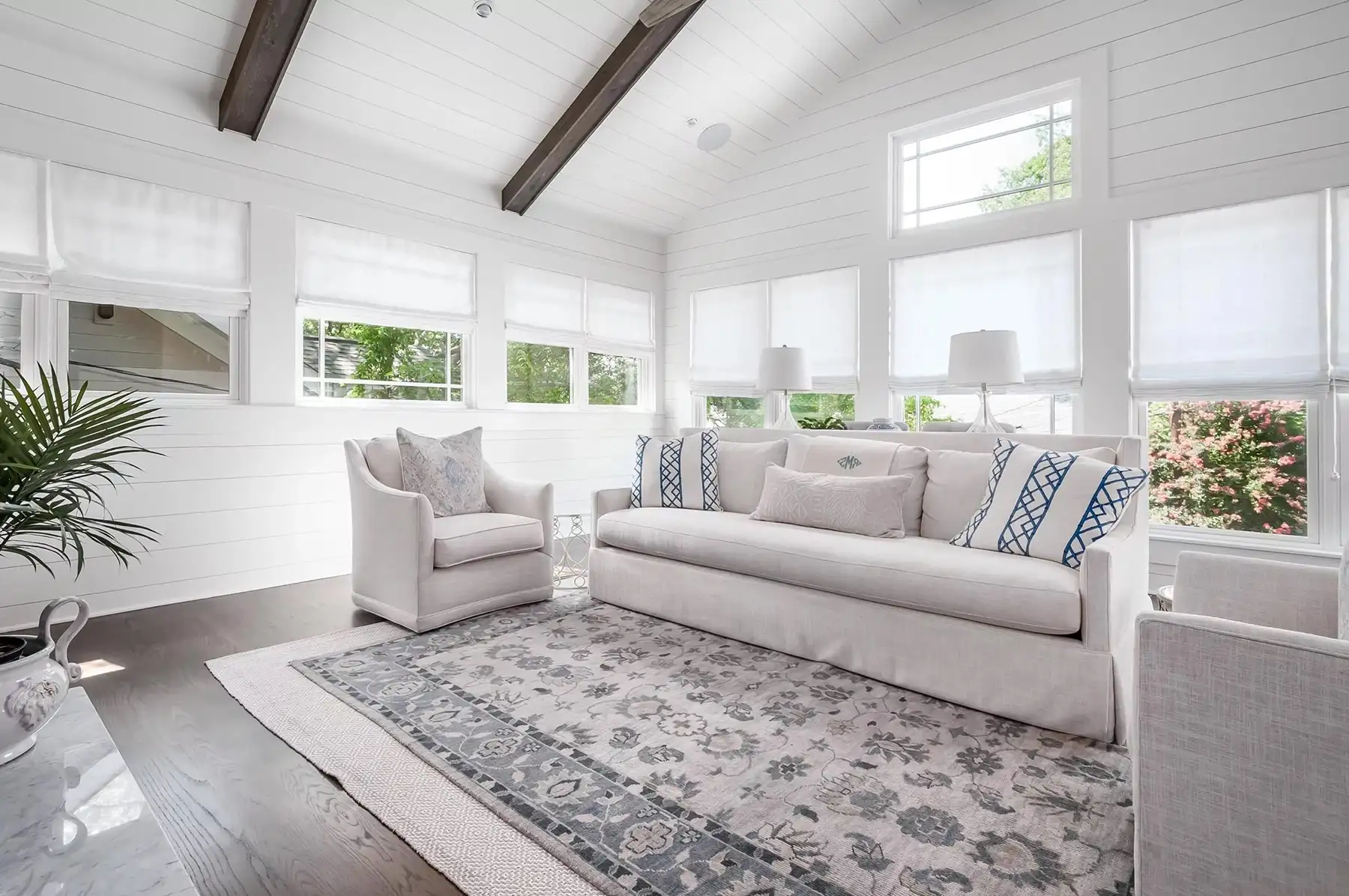 Washington Crossing Pennington Rd, Pennington, NJ 08534 5 | The Home X Bright living room with vaulted ceilings, exposed beams, and floor-to-ceiling windows.