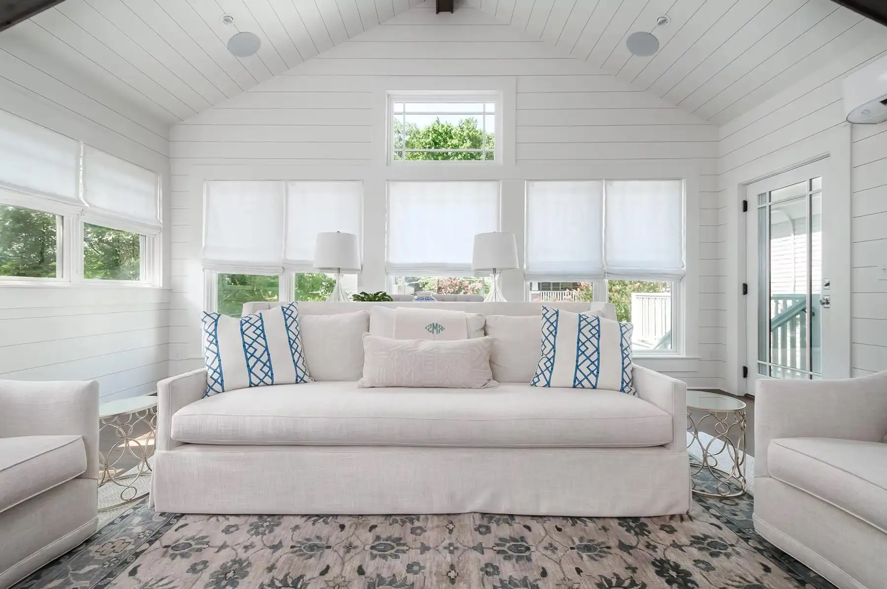 Washington Crossing Pennington Rd, Pennington, NJ 08534 6 | The Home X Elegant white living room with coffered ceiling, wood beams, and large windows.