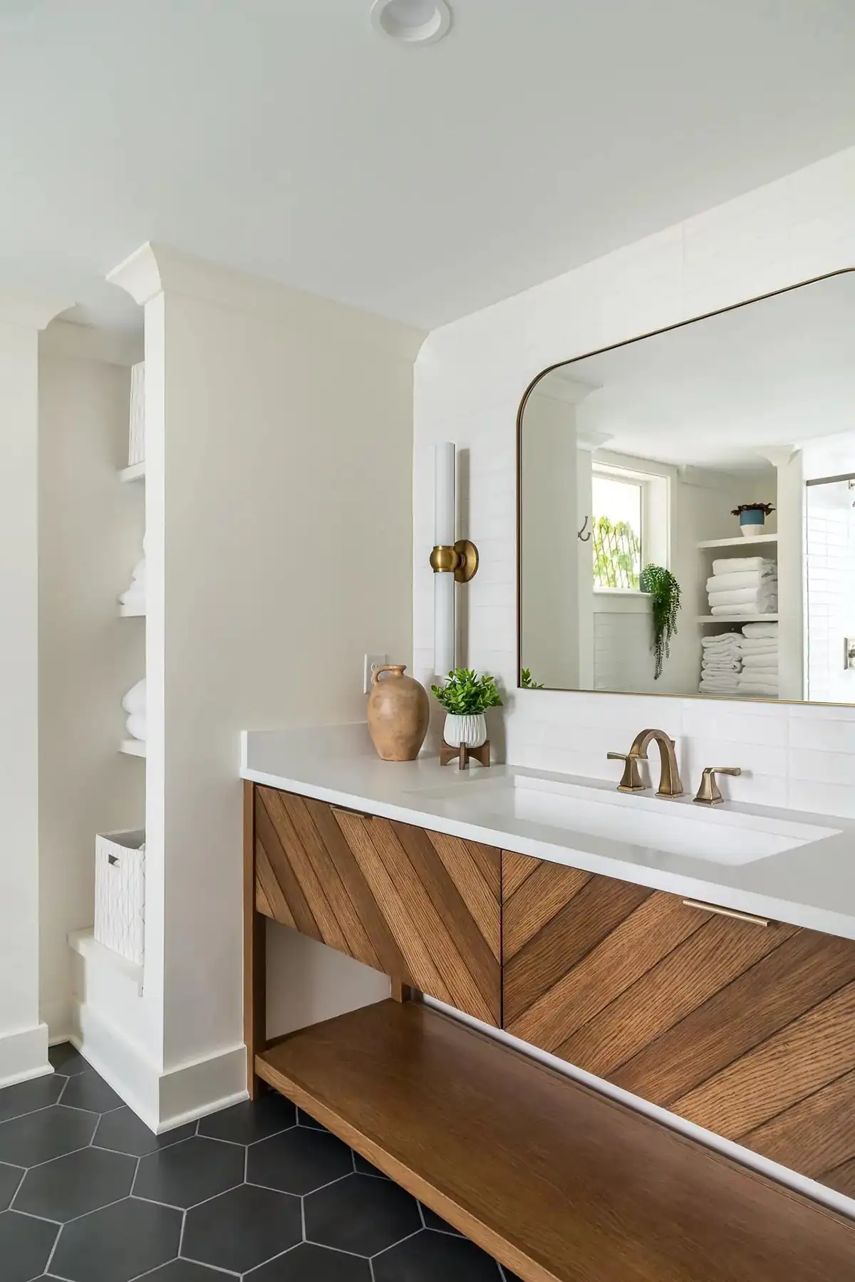Federal City Rd, Pennington, NJ 08534 13 | The Home X Bright modern bathroom with floating wooden vanity, oval mirror, and sleek fixtures.
