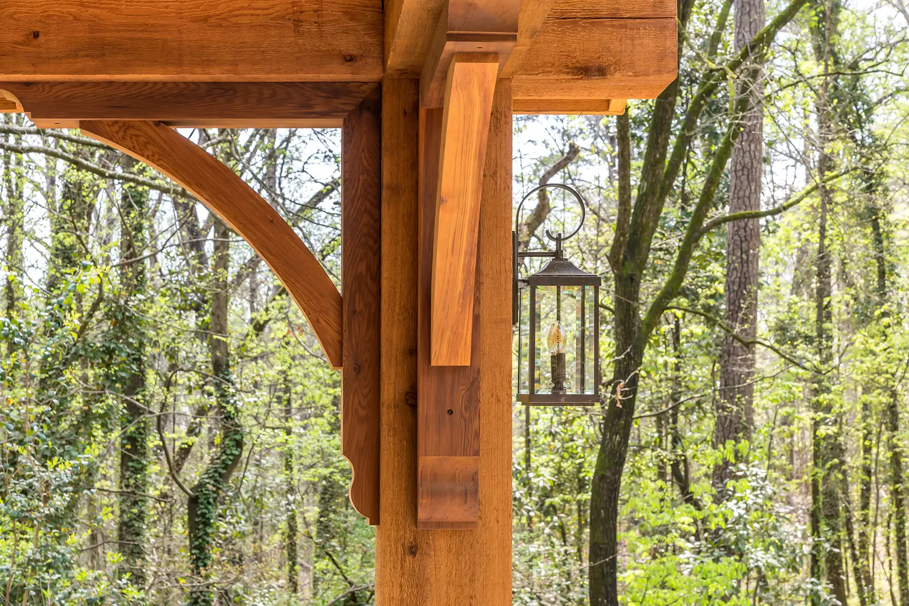Lower Mountain Rd, New Hope, PA 18938 9 | The Home X Timber-framed patio structure overlooking a wooded forest in New Hope, PA.