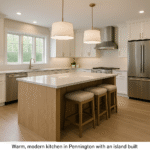 Luxury kitchen remodel in Pennington, NJ with rift-cut oak island, white quartz countertops, shaker cabinets, stainless appliances, and warm pendant lighting.