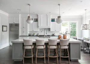 Light-filled kitchen remodel with large island and pendant lights in Princeton, NJ