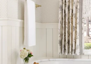 Elegant bathroom vanity with custom mirror and sconces in New Hope, PA remodel