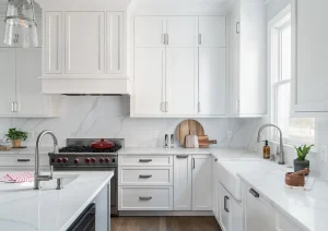 Full-height custom kitchen cabinets with quartz backsplash in Princeton home