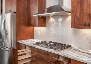 Custom wood kitchen drawers with spice pull-outs and granite counters in Lambertville, NJ remodel