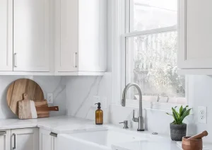 Bright white kitchen with farmhouse sink and custom cabinetry in Princeton, NJ