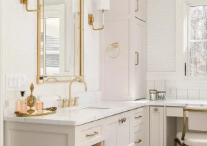Makeup vanity nook with backlit mirror and integrated drawers in a luxury New Hope, PA bathroom remodel