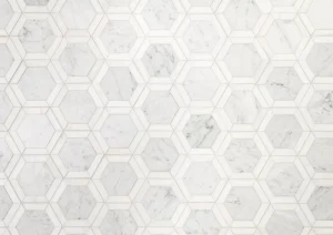 White hexagon tile bathroom flooring with subtle grey veining.