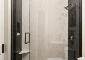 Elegant bathroom hallway with neutral tones, recessed lighting, and modern trim details in Newtown, PA.